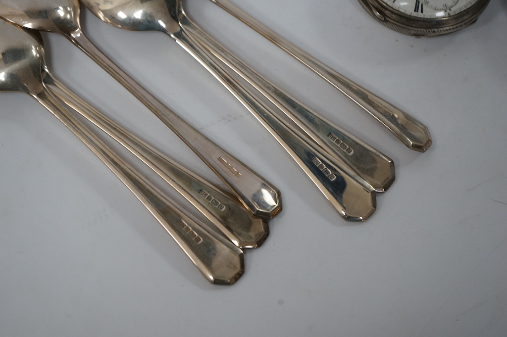 A set of six modern silver teaspoons, by United Cutlers Ltd, Sheffield, 1995, together with an earlier silver cigarette case and silver vesta case and two silver open faced pocket watches including J.W. Benson. Condition